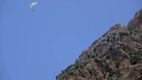 A person is paragliding in turkey Stock Footage 246718699