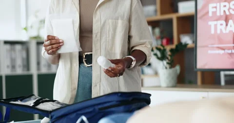Person, paramedic and presentation with first aid kit for healthcare training or Stock Footage 306140017