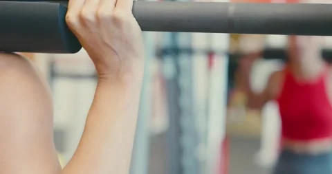 Person Performing Pull-Up Exercise at the Gym 스톡 동영상 323730432