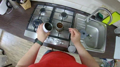 Person perspective man making coffee at home kitchen Stock Footage 247074381