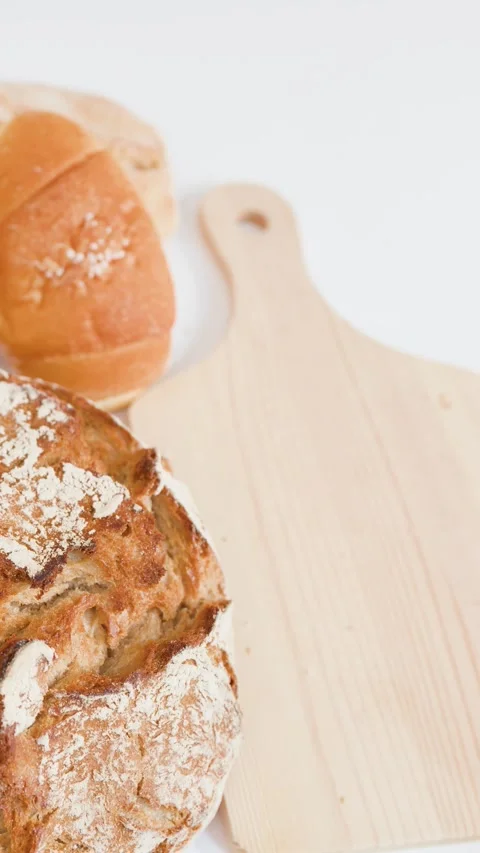 Person Picking Up Sliced Bread with Chocolate Hazelnut Spread Stock Footage 337876831