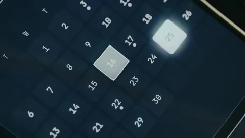 Person picks date 16 from a digital calendar Stock Footage 334444678