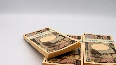 A person placing a large stack of banknotes Video stock 336556273