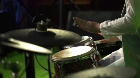 Person Playing Bongo Drums. Closeup Of woman's Hands Drumming Out A Beat Stock Footage 144798560