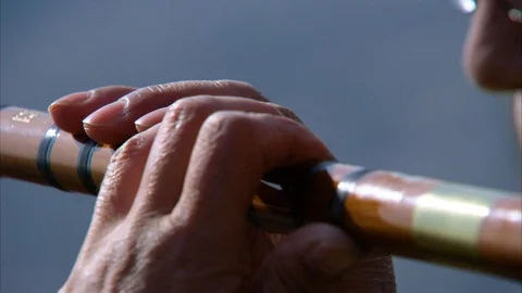 Person playing flute Stock-Footage 88374989