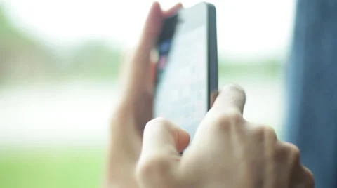 Person playing game on smartphone, close-up Stock Footage 63289341