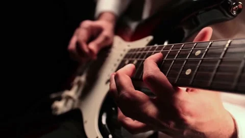 Person playing on guitar Stock Footage 151920688