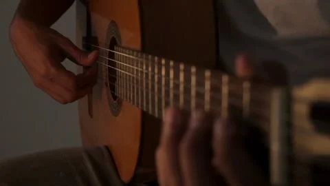 A person playing guitar Stock-Footage 271347437