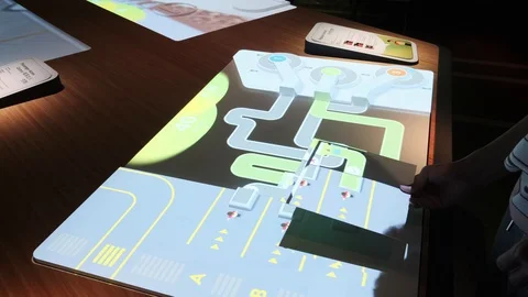 Person Playing an Interactive RFID Learning Game at Changi Experience Stock Footage 111339998