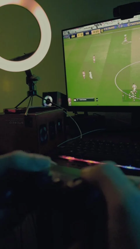 A person playing PlayStation using a controller Stock Footage 299577905