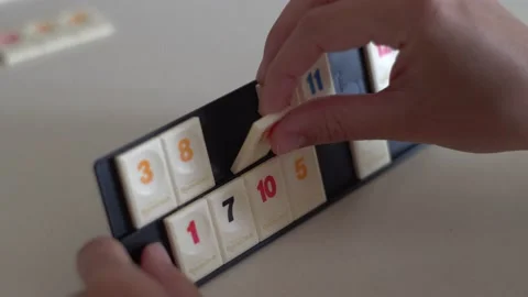 Person playing tile-based game 스톡 동영상 133569742