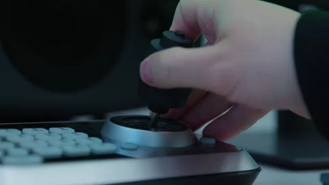 A person is playing a video game with a controller Stock Footage 273123044