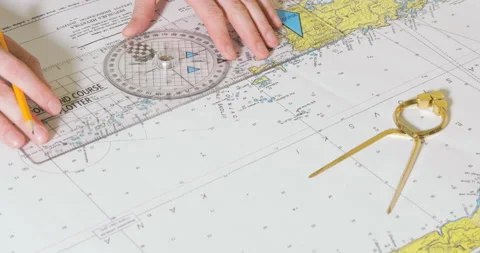 Person plotting course for sailing Stock Footage 85516828