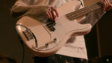 Person Plugging In Electric Guitar Cable and Adjusting Knobs in Music Studio 스톡 동영상 305845649