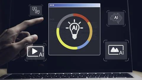 A person is pointing at a computer screen with a light bulb icon Stock Photos
