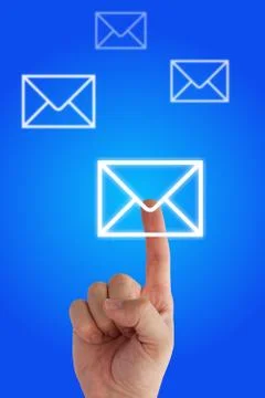 Person pointing at a "message" button with finger on a blue background Stock Photos