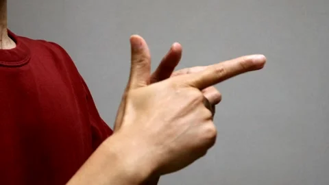 A person pointing to the side Stock Footage 335560092