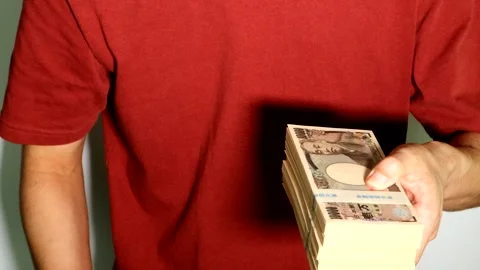 A person posing with a large sum of money. Stock Footage 334718637