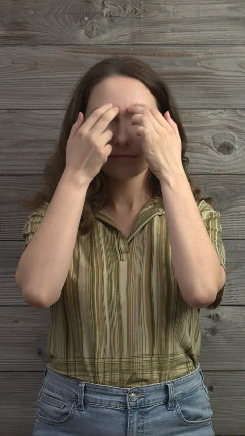 Person practicing EFT,  inner eyebrow meridian point.  Vertical video. Stock Footage 279265561