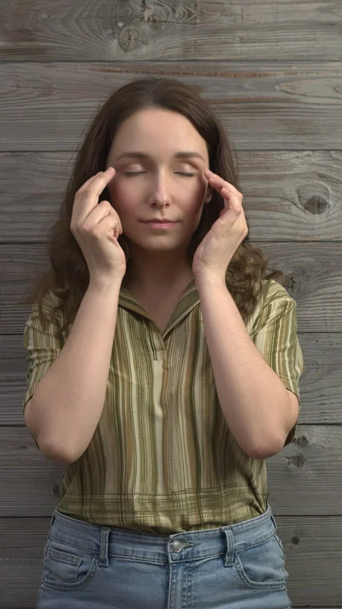 Person practicing EFT,  side of the eye meridian point.  Vertical video. Stock Footage 279267082