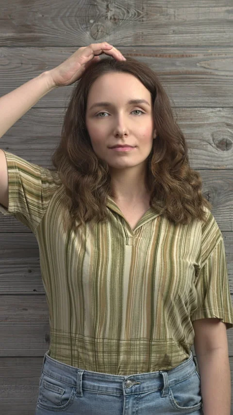 Person practicing EFT, top of head  meridian point.  Vertical video. Stock Footage 279266990