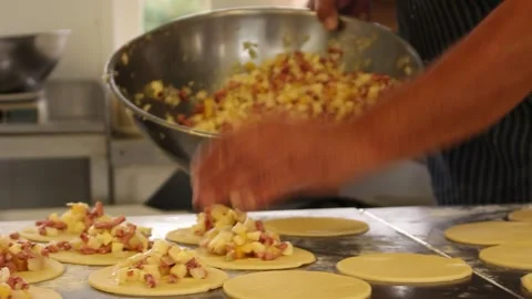 Person preparing cornish pasty Stock Footage 274082322