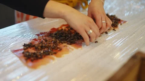 A person is preparing a dish with bacon and cheese Video stock 295369805