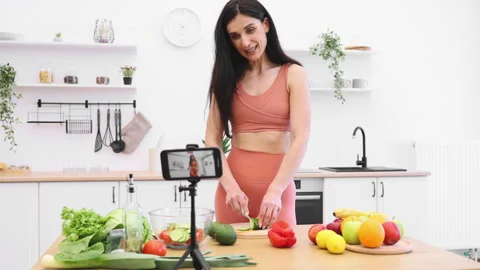 Person preparing meal out of vegetable on cell phone camera Stock Footage 247202022