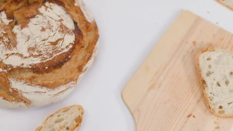 Person Preparing Sourdough Bread and Butter for Breakfast Video stock 337925952