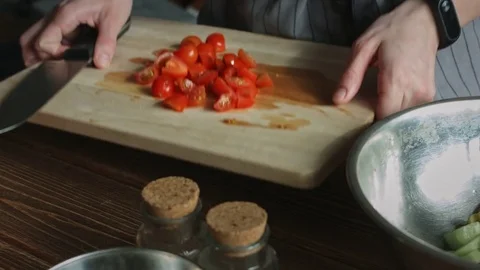 Person preparing vegetable salad Stock Footage 73906818