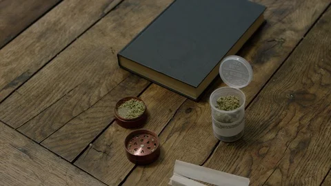 Person preparing weed joint Stock Footage 107690214