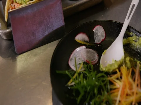 Person preparing a wrap Stock Footage 83185218