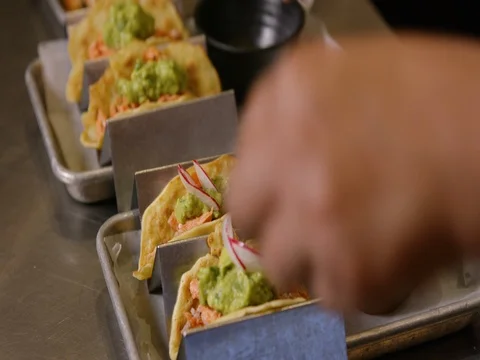 Person preparing a wrap Stock Footage 83185230