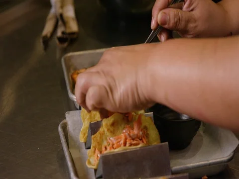 Person preparing a wrap Stock Footage 83185261