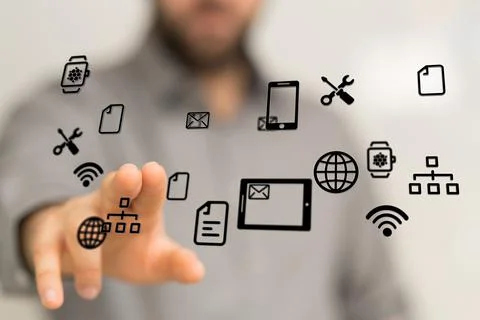 A person presenting a 3D render of cloud-connected to many objects on a virtu Stock Photos