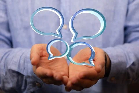 A person presenting a 3D render of communication with colorful dialog speech  Stock Photos