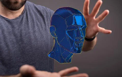 Person presenting a 3D render of a cyborg head construction Foto stock