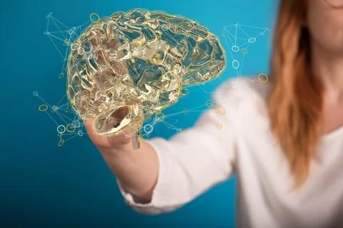 A person presenting a 3D render of human brain - IQ testing and artificial in Stock Photos
