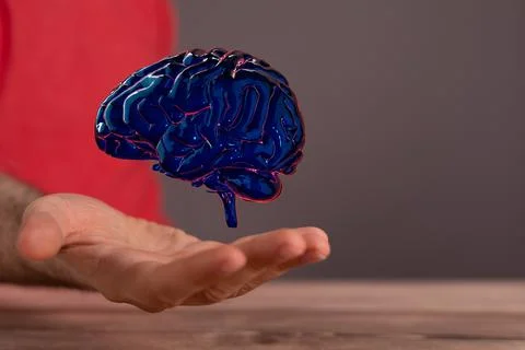 Person presenting a 3D render of human brain - IQ testing and artificial intelli Foto stock