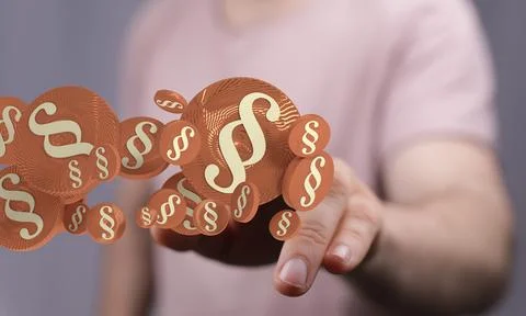 Person presenting 3D render of law and justice symbols 스톡 사진