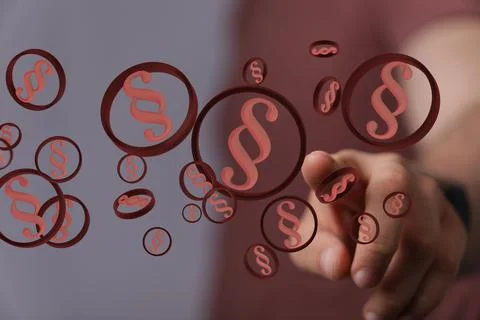 A person presenting the 3D render of paragraph section signs - law and justic Foto stock