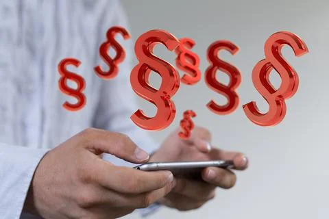 A person presenting the 3D render of paragraph section signs - law and justic Foto stock