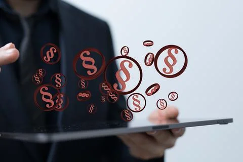 A person presenting the 3D render of paragraph section signs - law and justic 写真素材