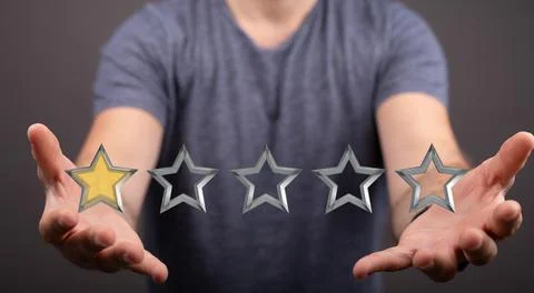 Person presenting 3D render of rating stars Foto stock