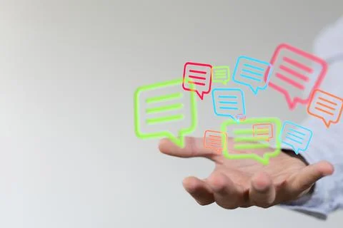 Person presenting a 3D render of speech bubbles - People Chatting Stock Photos