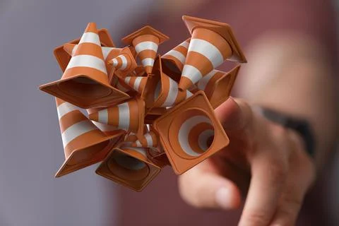 Person presenting the 3D render of traffic cones under construction concept Foto stock