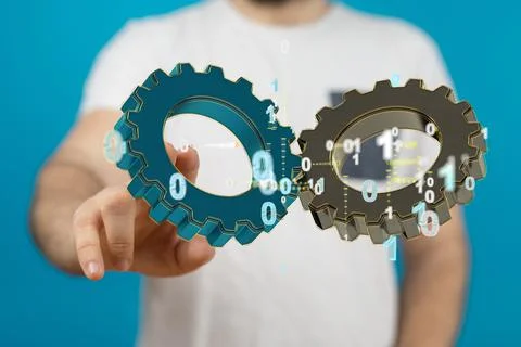 Person presenting 3D rendering of digital gears with binary codes Stock Photos