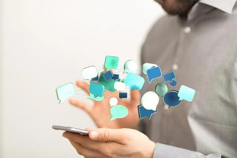 Person presenting the virtual 3D rendered projection of speech bubbles Stock Photos