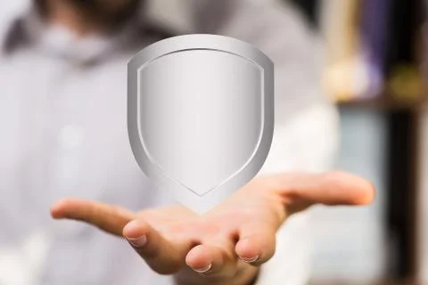 Person presenting the virtual projection of a digital shield Stock Photos