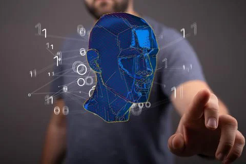 Person presenting the virtual projection of the polygonal human face Stock Photos